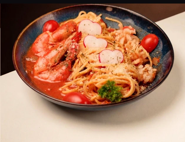 Seafood Tomato Pasta from the Pedal & Rolls menu