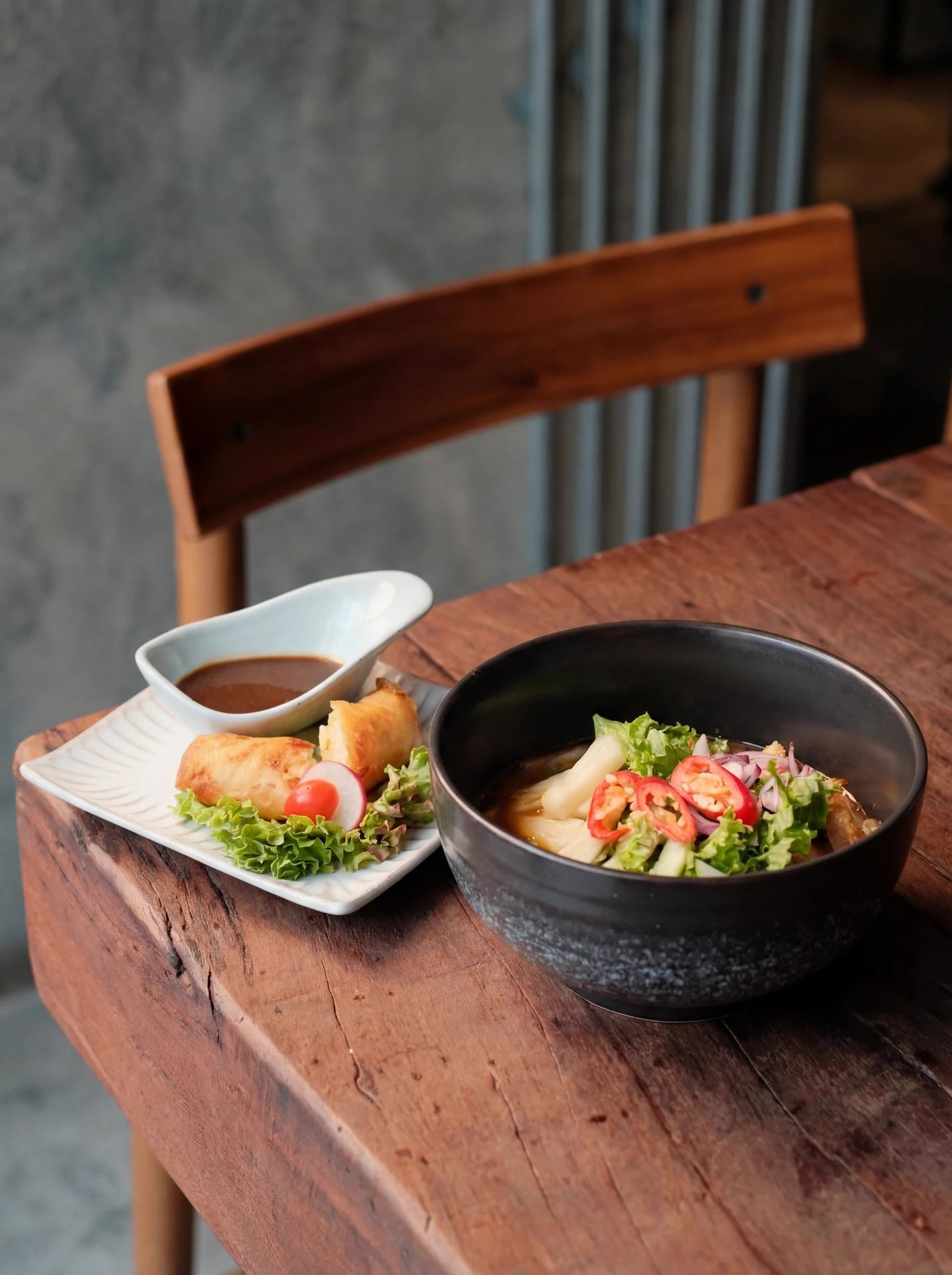 Signature asam laksa with fried spring roll