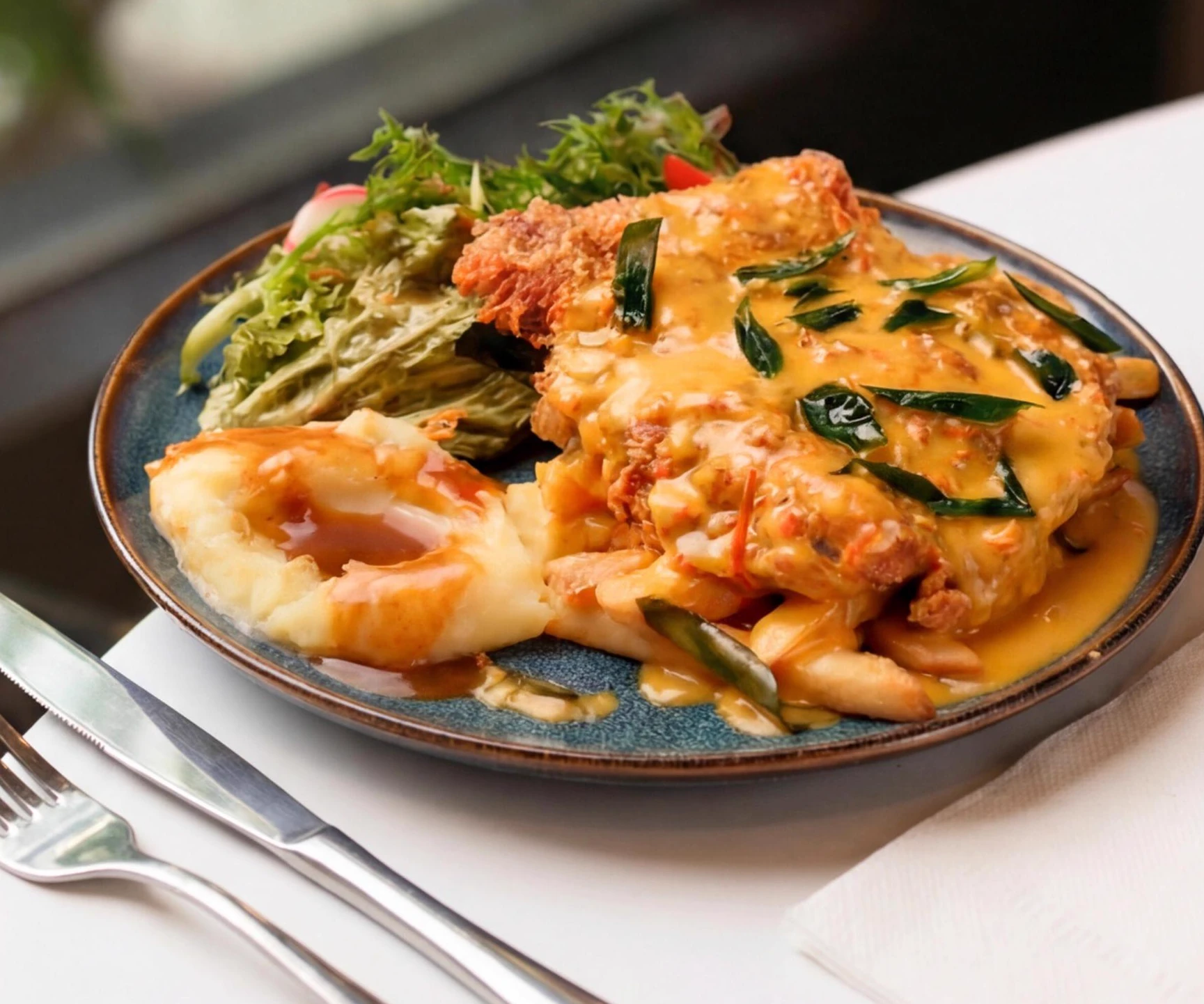 Salted Egg Fried Chicken Chop from the Pedal & Rolls menu