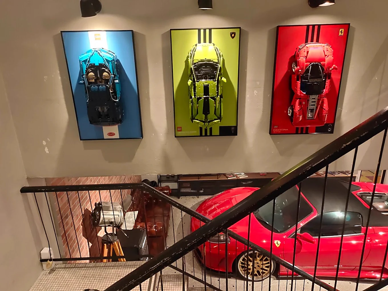 Red sports car inside the real Pedal & Rolls café